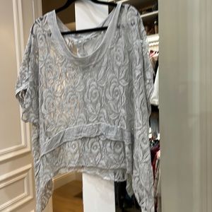 Lace poncho handmade in Italy